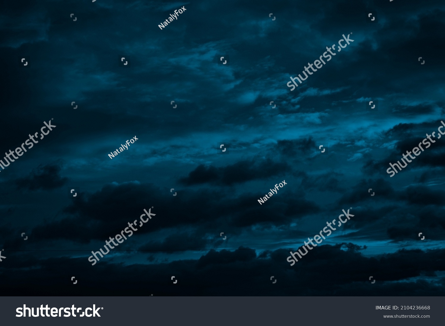  Dramatic sky with clouds. Black blue green night sky. Thunderstorm. Dark teal color background. Ominous,  frightening.                             #2104236668