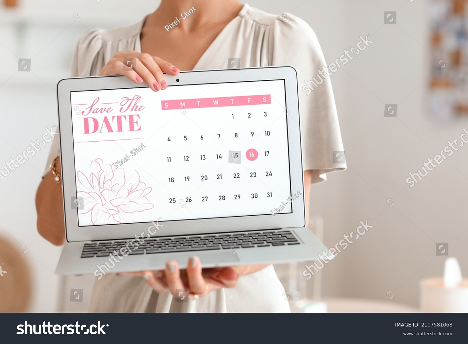 Female wedding planner with laptop in office, closeup #2107581068