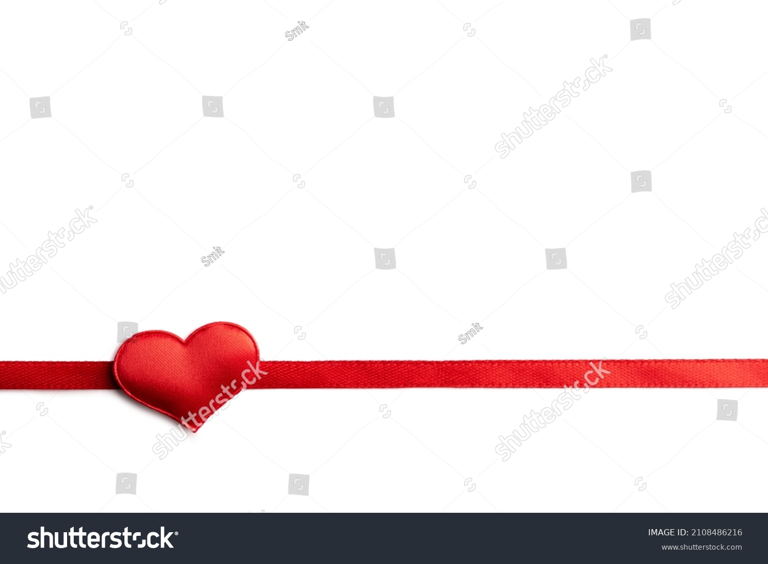 Creative Valentines Day postcard design with red ribbon and red textile heart on white background isolated. Valentine day and love concept #2108486216