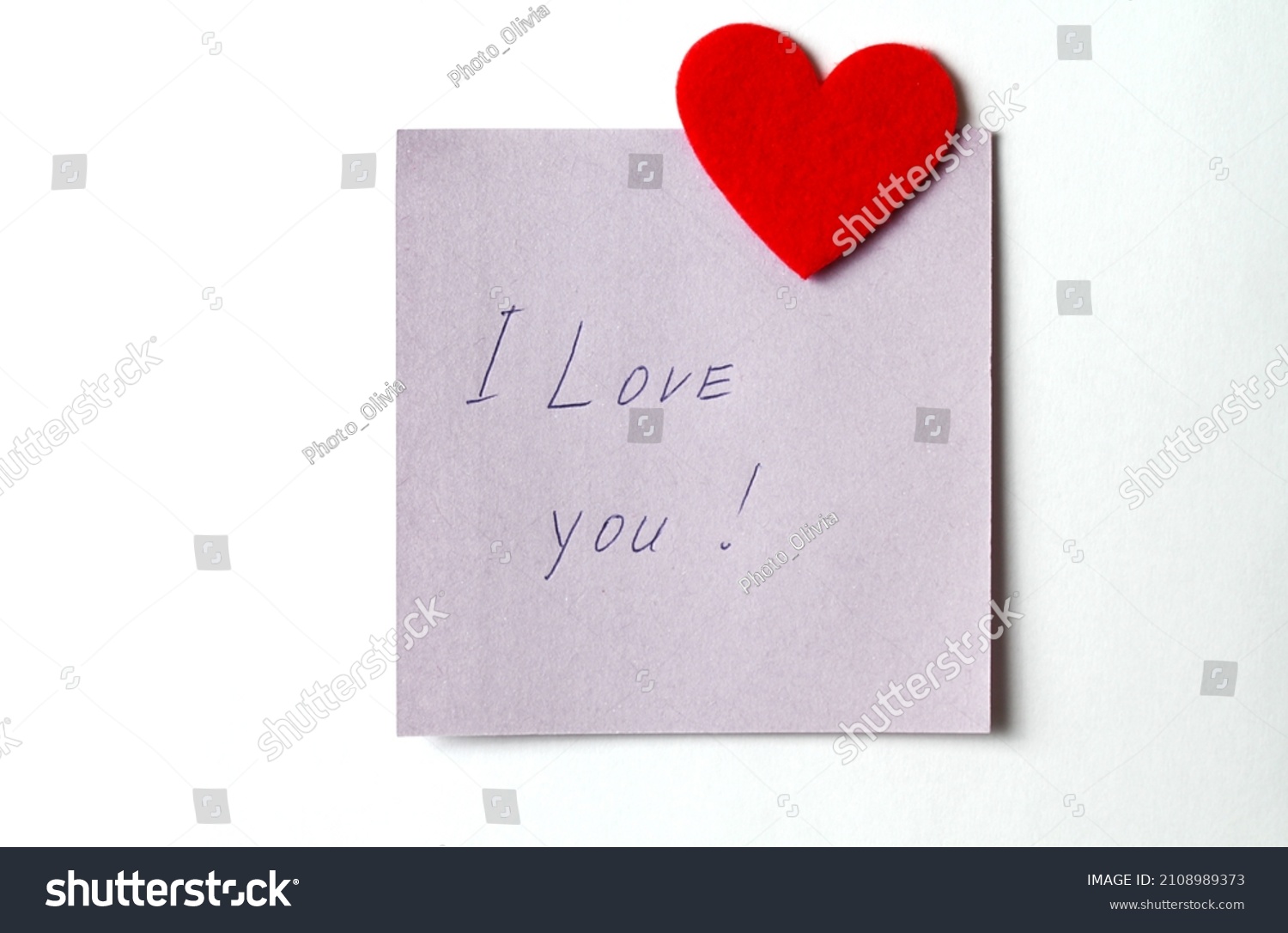 A close up of a sticky note with the word I Love You with red heart. Valentine's Day. Valentine's Day background. I love you lettering text. love concept. #2108989373