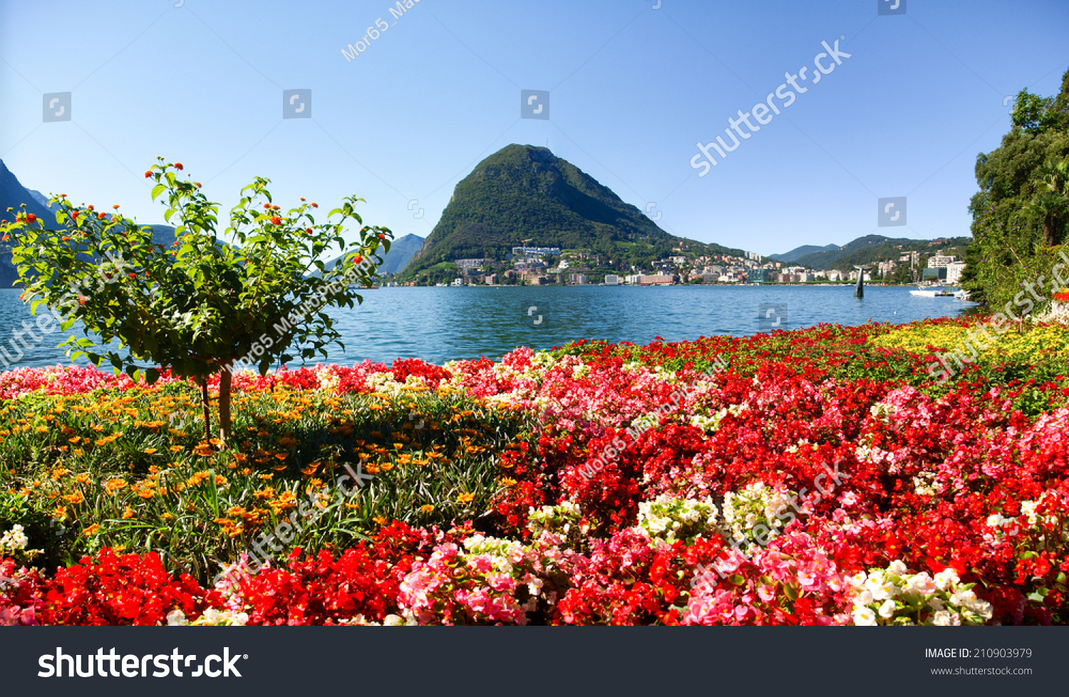 Lugano, Switzerland - Juli 31, 2014: Images of the Gulf of Lugano from Monte Bre above the City. #210903979