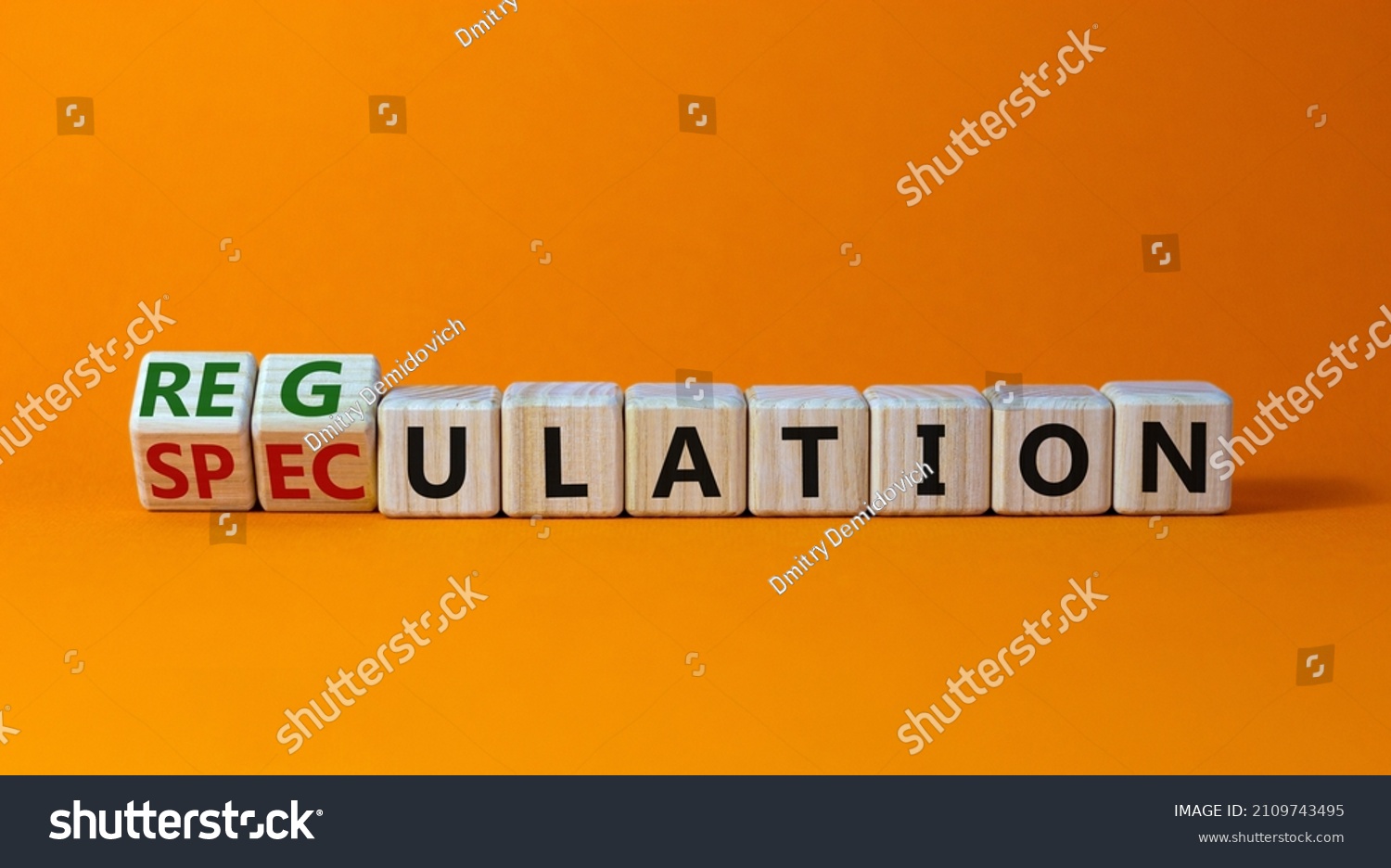 Speculation or regulation symbol. Turned cubes and changed the word speculation to regulation. Beautiful orange table, orange background, copy space. Business, speculation or regulation concept. #2109743495