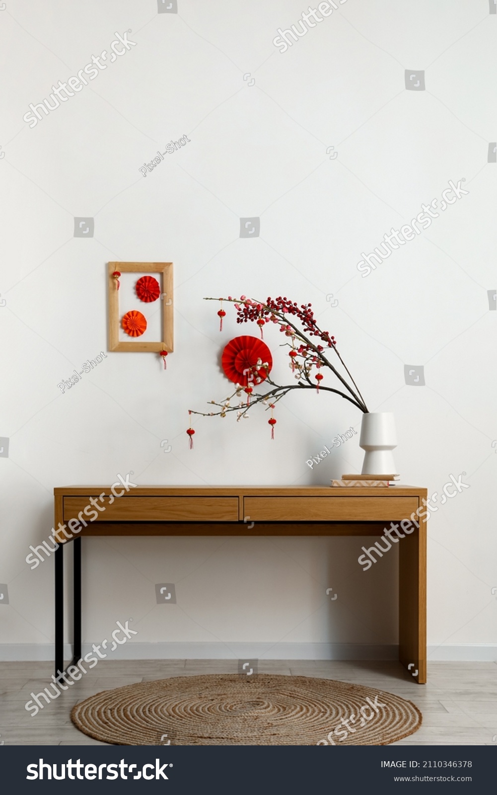 Table with beautiful decorations for Chinese New Year celebration in room #2110346378