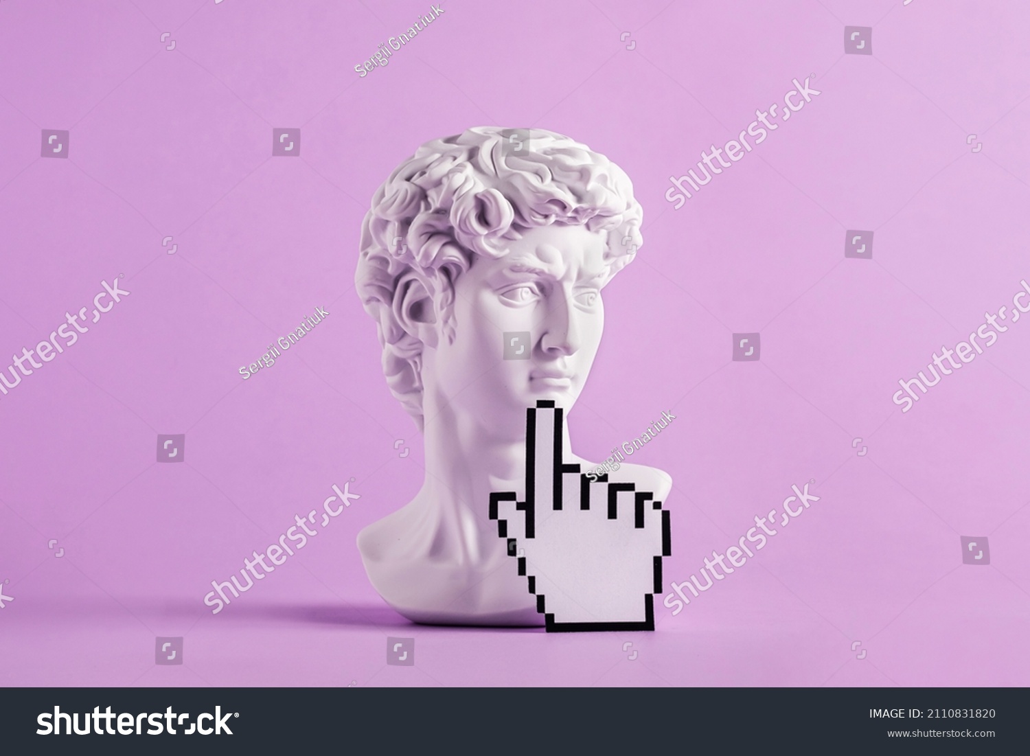Historical antique statue of david's head and mouse cursor with finger. Concept of modern art and vaporwave and cyberpunk #2110831820