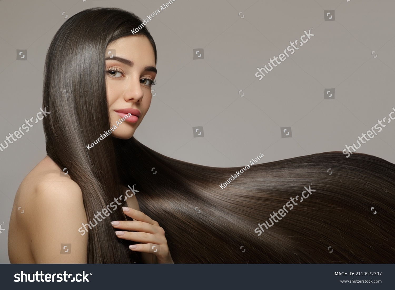 Fashion woman with straight long shiny hair. Beauty and hair care #2110972397