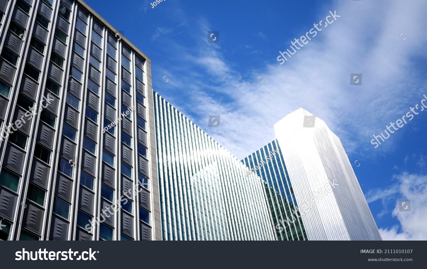 Daytime Establishing Photo of Corporate Buildings against Blue Sky #2111010107