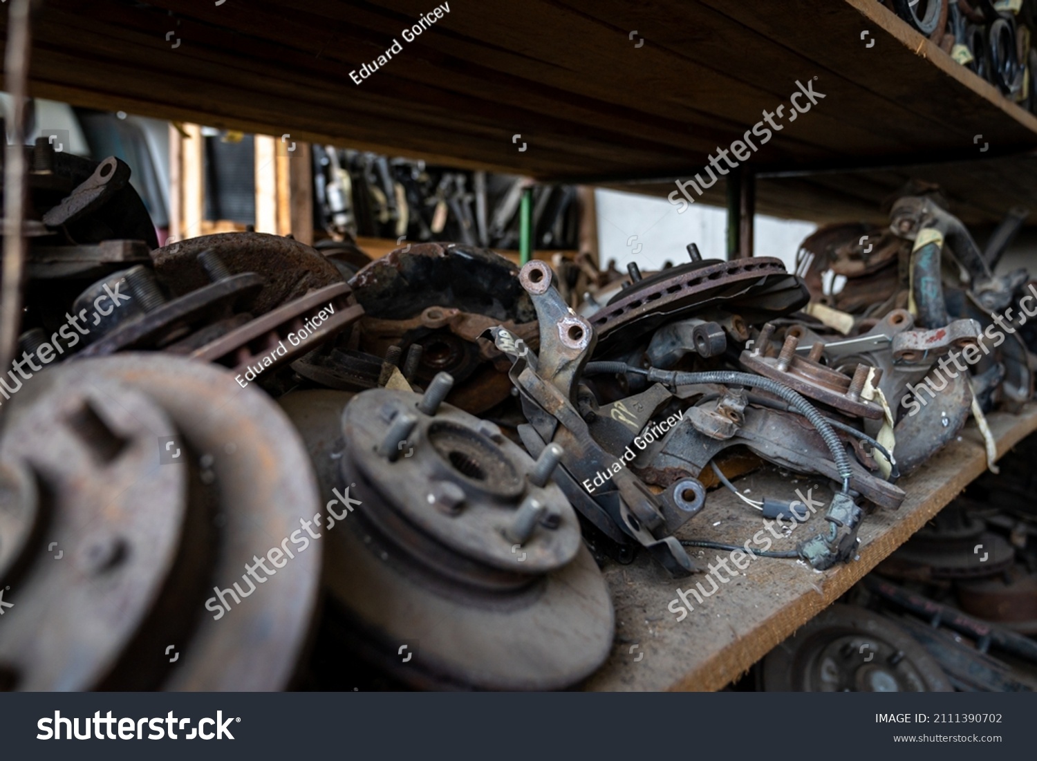 parts of dismantled cars at the car wreck #2111390702