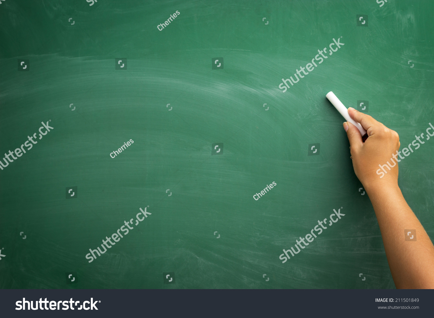 Blank blackboard / chalkboard, hand writing on green chalk board holding chalk, great texture for text #211501849