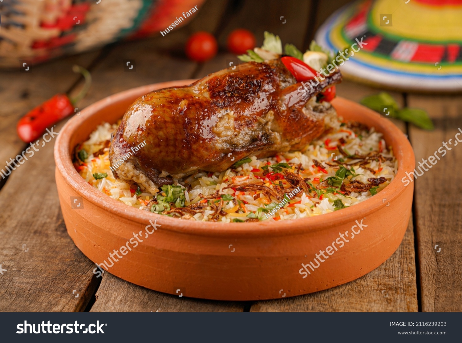 Arabic Cuisine; Egyptian traditional stuffed pigeon or "Hamam Mahshi" dish. #2116239203