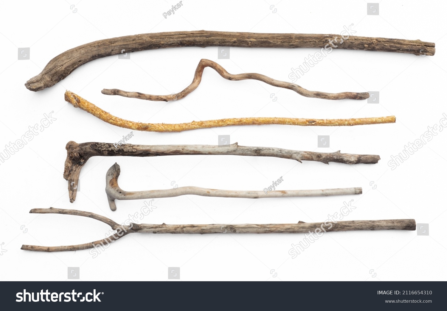 ancient sticks for walking isolated on white background #2116654310