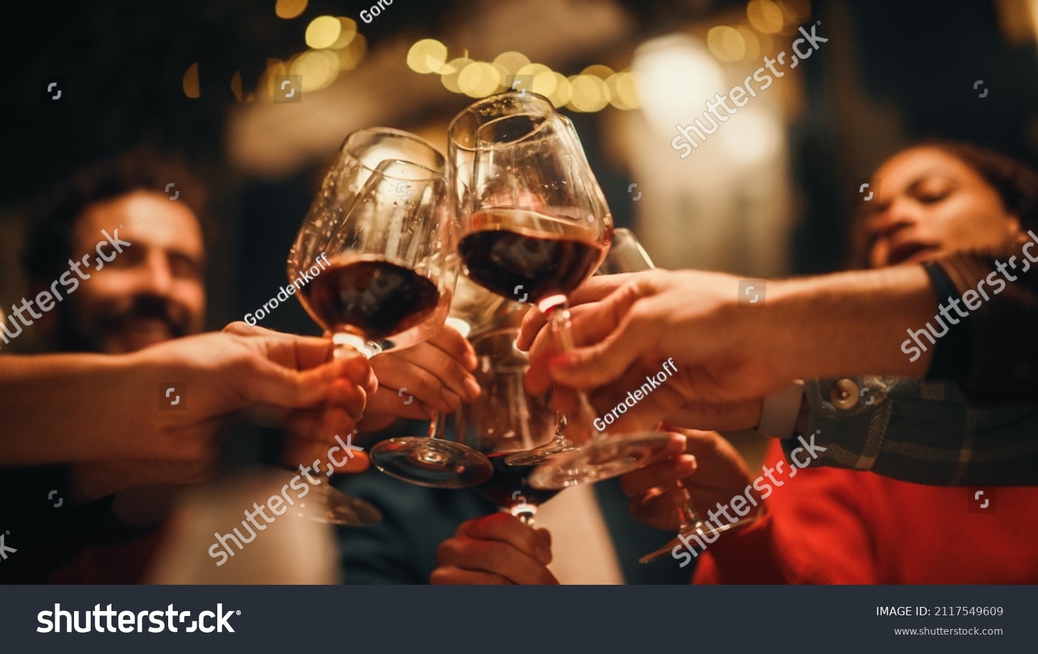 Close Up Shot of People Cheers, Making Toasts and Touch with Wine and Champagne Glasses at a Garden Party Celebration with Friends on a Warm Summer Evening. Beautiful People Enjoy Life on a Weekend. #2117549609
