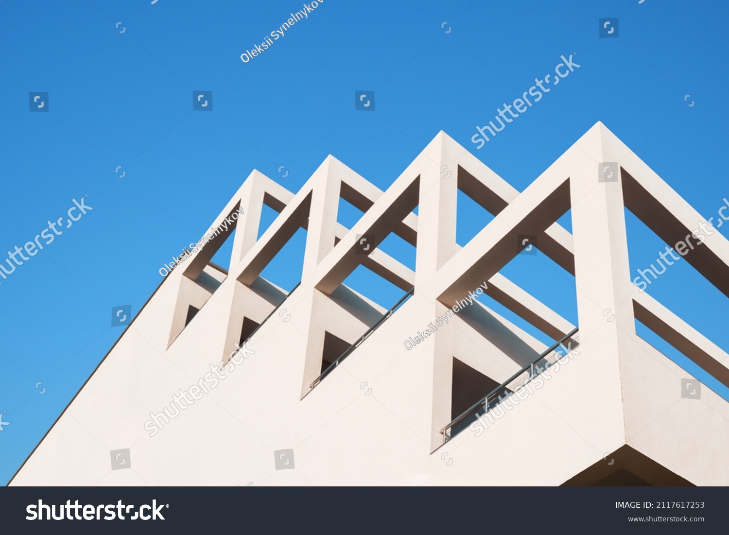 Modern architecture minimal building abstract concrete house. Abstract architecture geometric building modern pillar arch balcony construction. Geometry architecture design building balcony background #2117617253