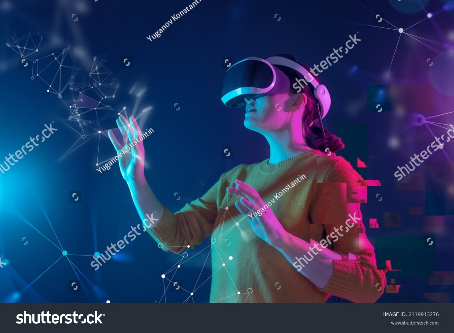 Metaverse technology concept. Woman with VR virtual reality goggles. Futuristic lifestyle. #2119913276