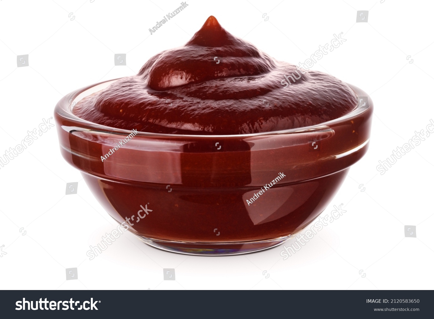 Barbecue sauce in glass transparent bowl, close-up. Isolated on white background. #2120583650
