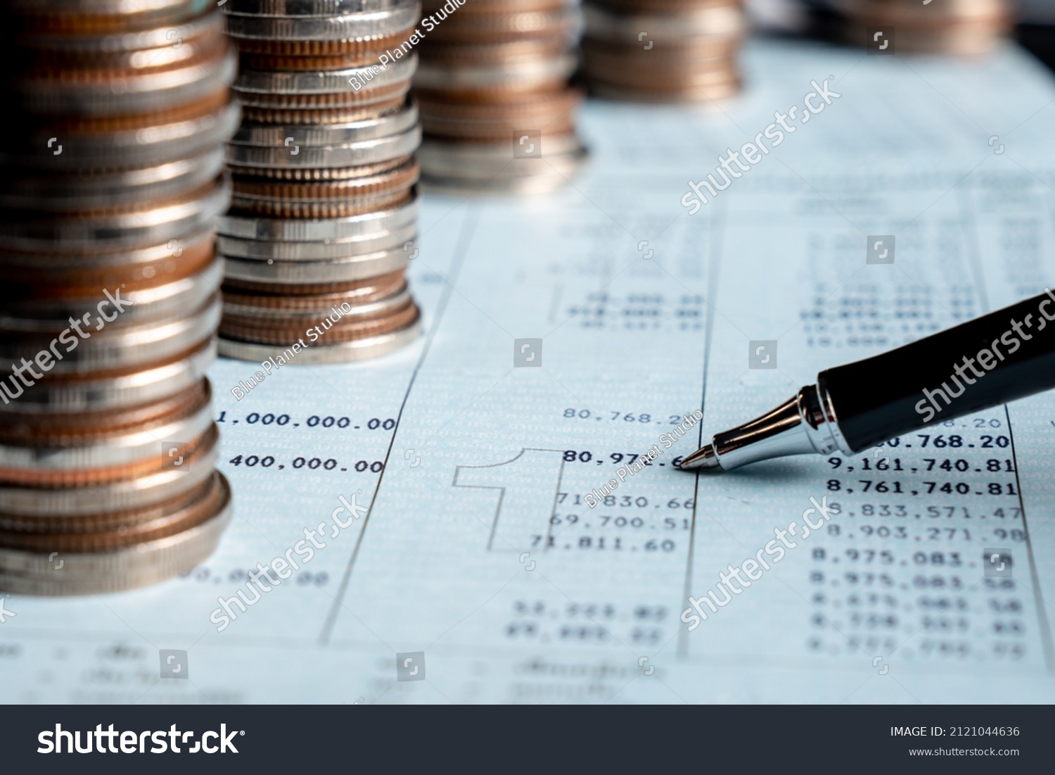 Pile of gold coins money stack in finance treasury deposit bank account saving . Concept of corporate business economy and financial growth by investment in valuable asset to gain cash revenue . #2121044636