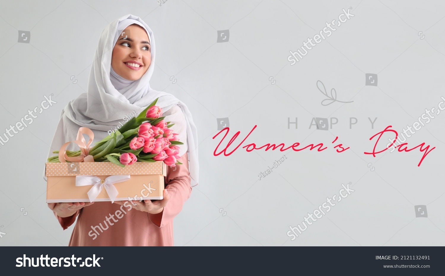 Beautiful greeting card for International Women's Day celebration with young Muslim woman holding gift #2121132491
