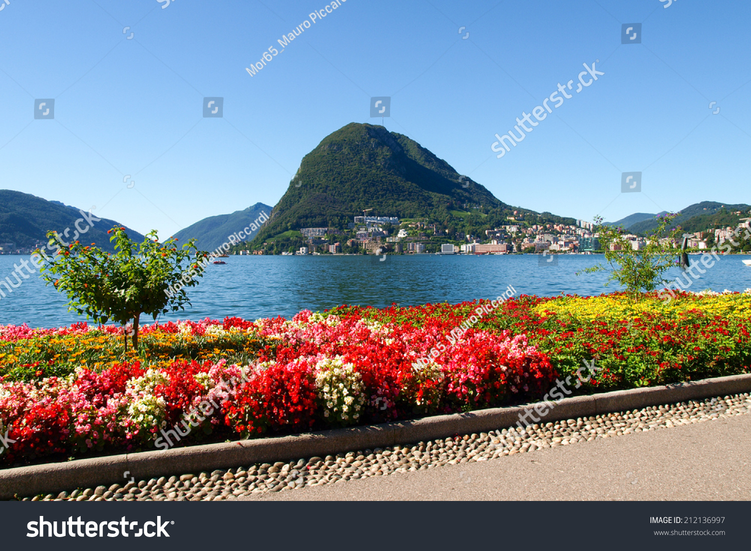 Lugano, Switzerland - Juli 31, 2014: Images of the Gulf of Lugano from Monte Bre above the City. #212136997
