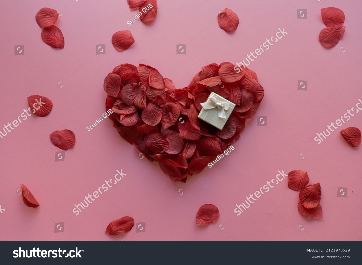 Valentine's day heart made with rose petals and gift box #2121973529
