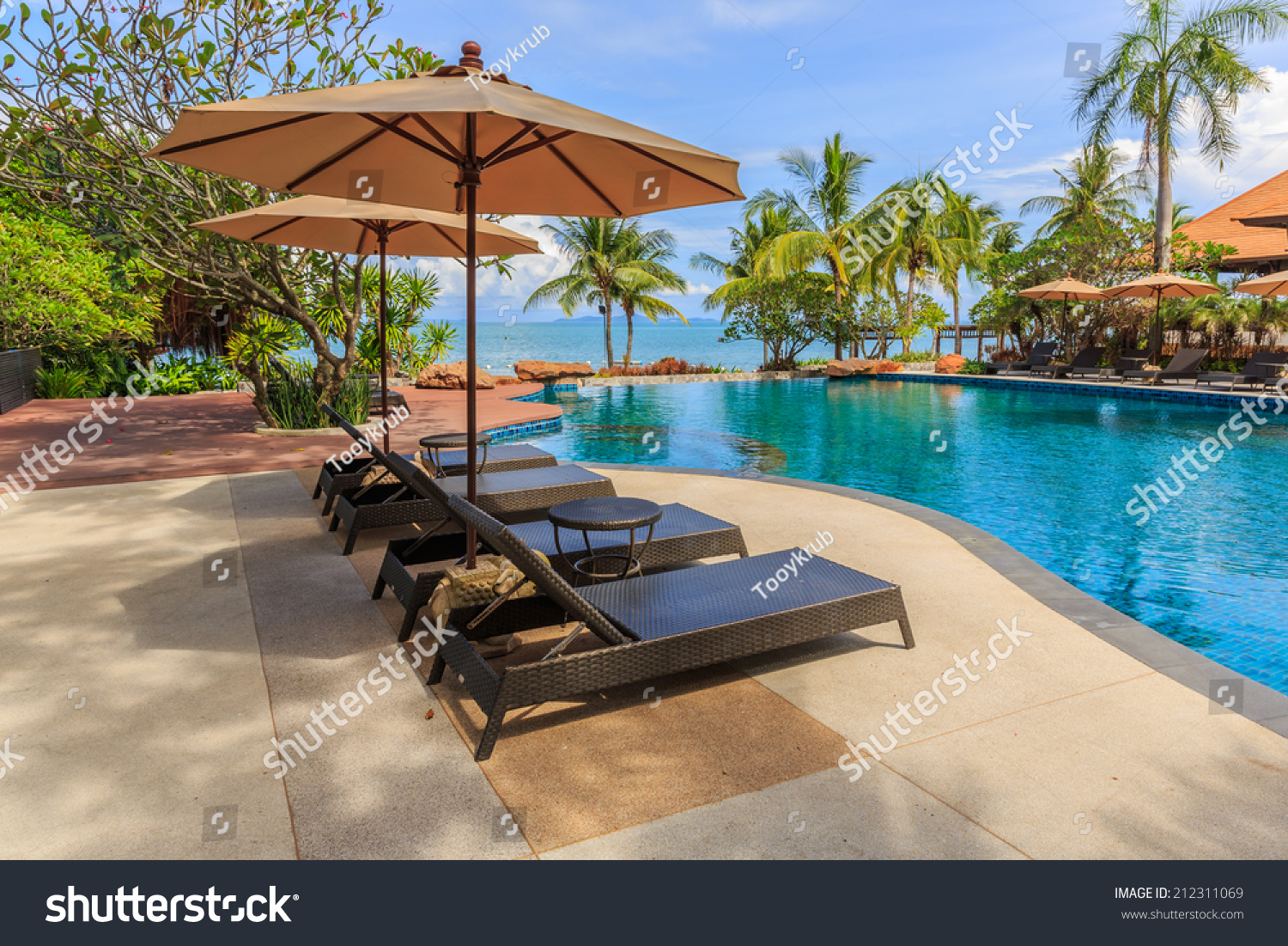 PATTAYA, THAILAND - SEP 7 : Pool chairs of Sea Sand Sun Hotel on Sep 7. The hotel consist of 60 boutique-style masterpiece Villas and Rooms, finest collection of Villa accommodation in the Pattaya. #212311069