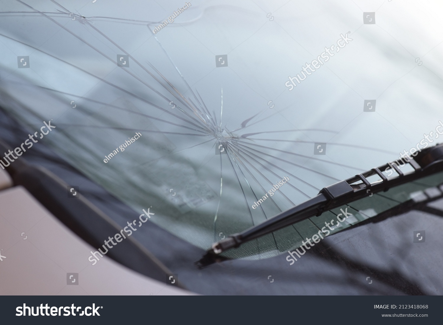breakage of the windshield of a car, vehicle glass damage #2123418068