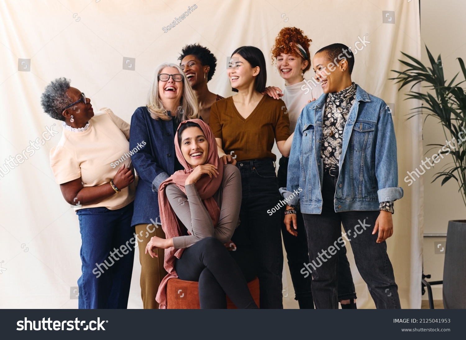 Portrait of cheerful mixed age range multi-ethnic women celebrating International Women's Day #2125041953