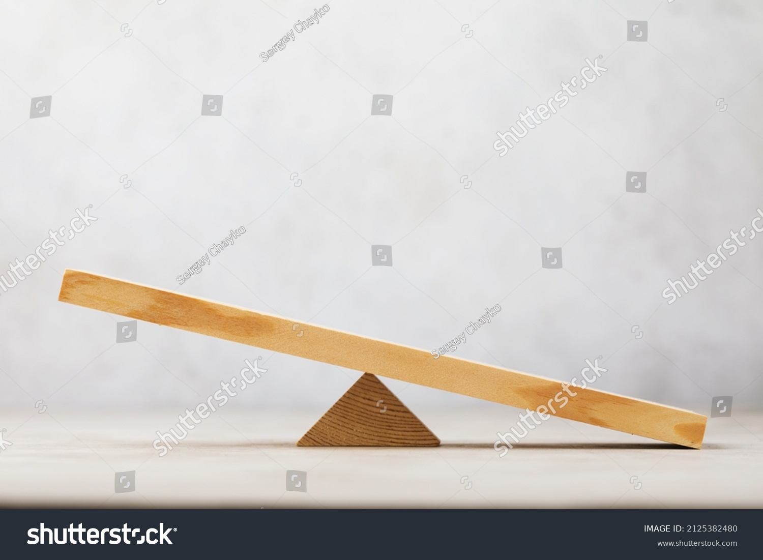 Wooden swing or scales on an abstract background, a template for the designer #2125382480