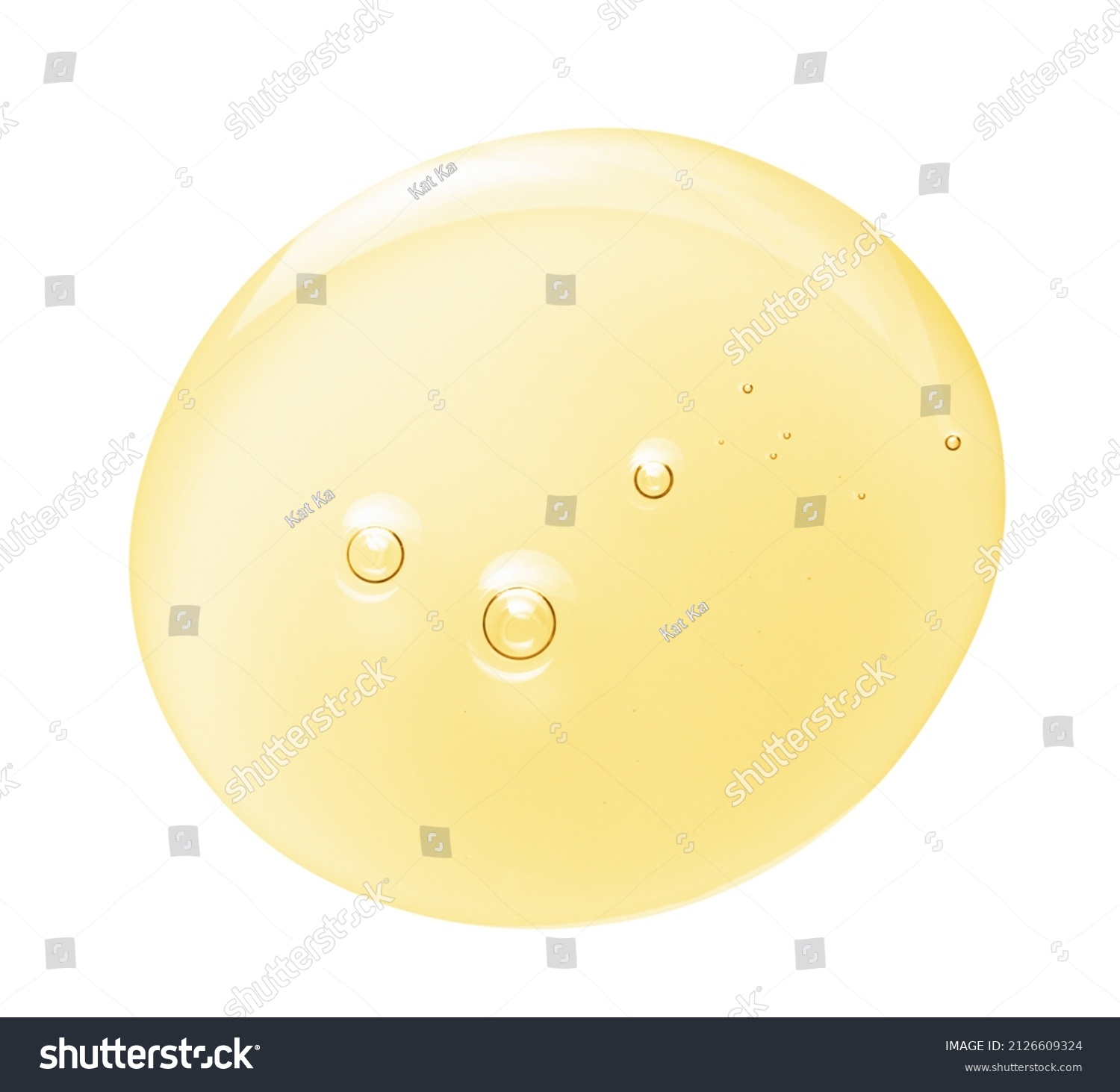 Argan oil serum gel drop texture. Yellow cosmetic liquid with bubbles isolated on white background. Skincare beauty product swatch macro #2126609324