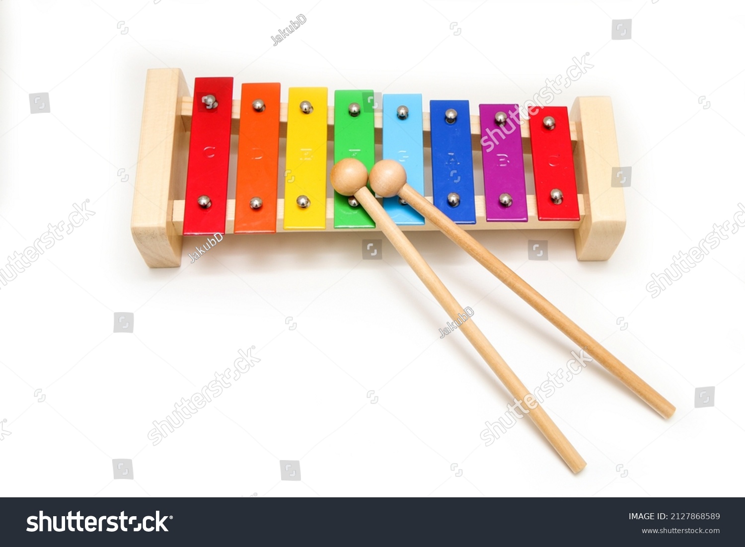 The basic xylophone for children to learn to play simple music. Isolated in a white background.  #2127868589