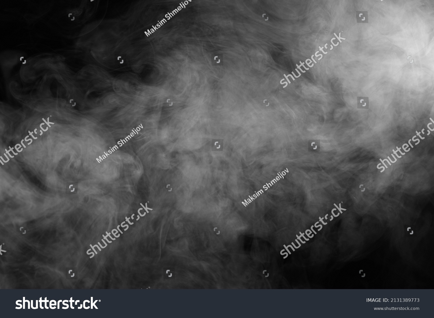 Abstract smoke texture over black. Fog in the darkness. #2131389773