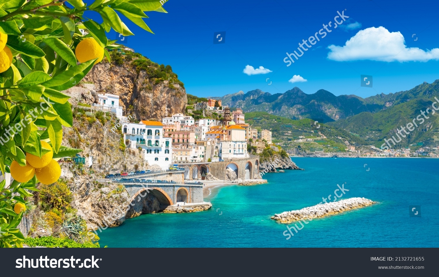Beautiful view of Amalfi on the Mediterranean coast with lemons in the foreground, Italy #2132721655