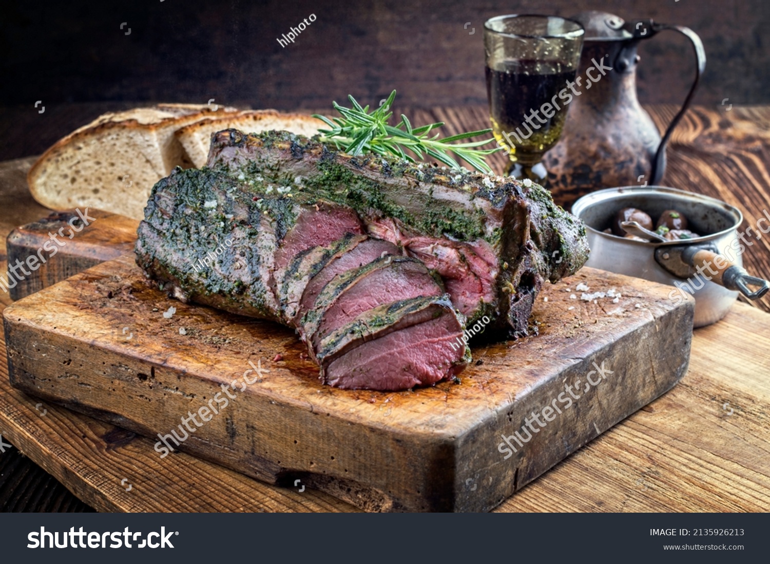 Barbecue Saddle of Venison on Cutting Board #2135926213