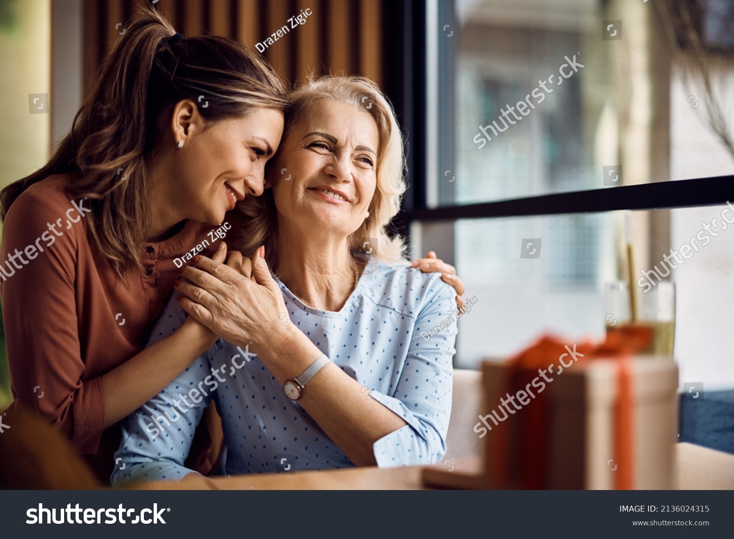 Happy senior woman enjoying in daughter's affection on Mother's day. #2136024315