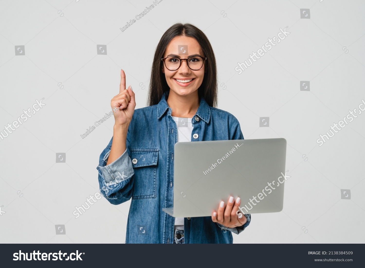 Young smart caucasian student freelancer woman using laptop for remote work, e-learning at university college, e-banking, online shopping, webinars having idea startup isolated in white background #2138384509