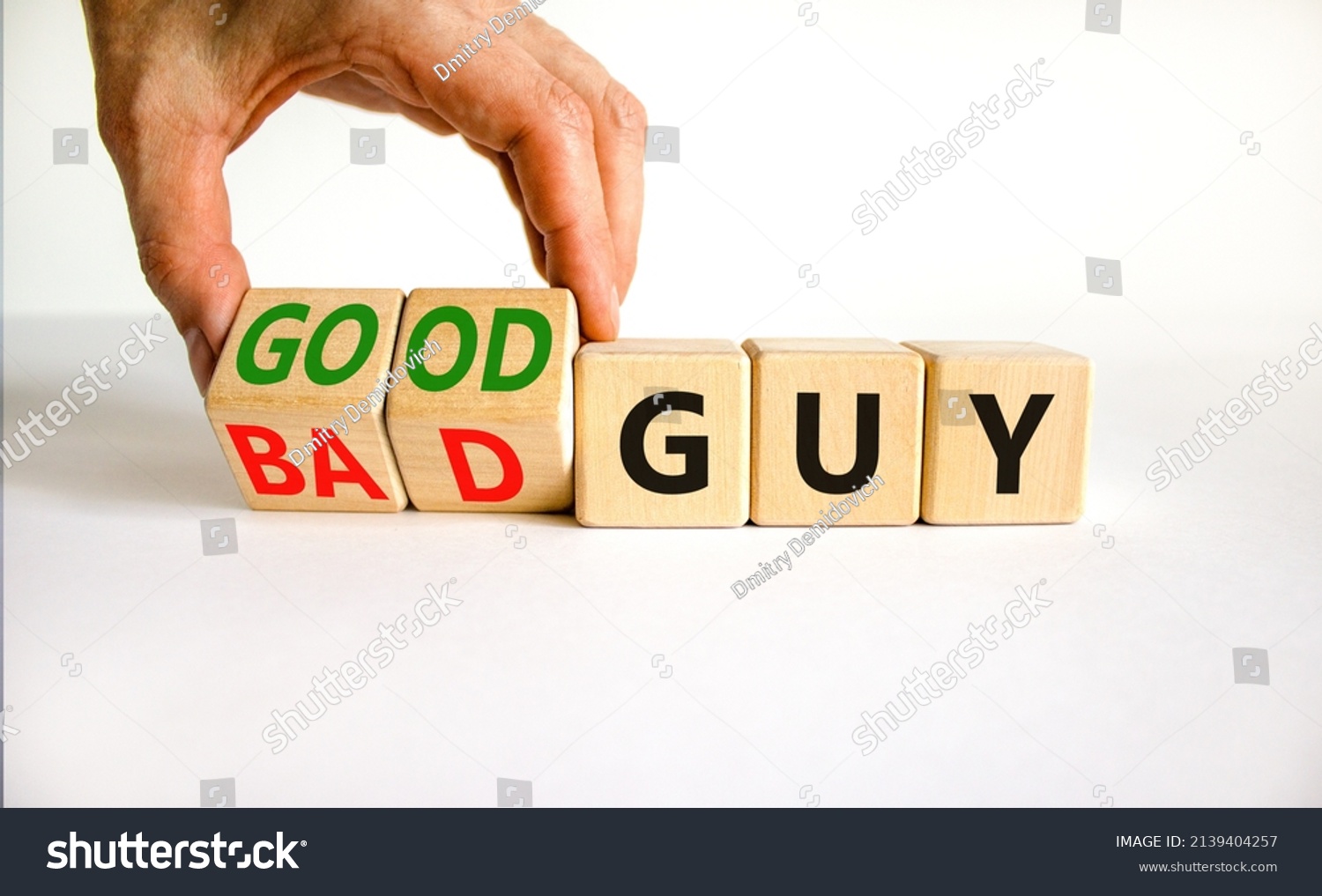 Good or bad guy symbol. Businessman turns cubes and changes concept words Bad guy to Good guy. Beautiful white background. Business psychological good or bad guy concept. Copy space. #2139404257
