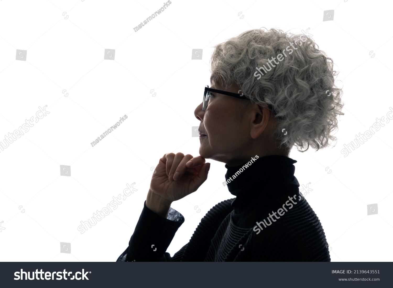Silhouette of thinking elderly Asian woman. #2139643551
