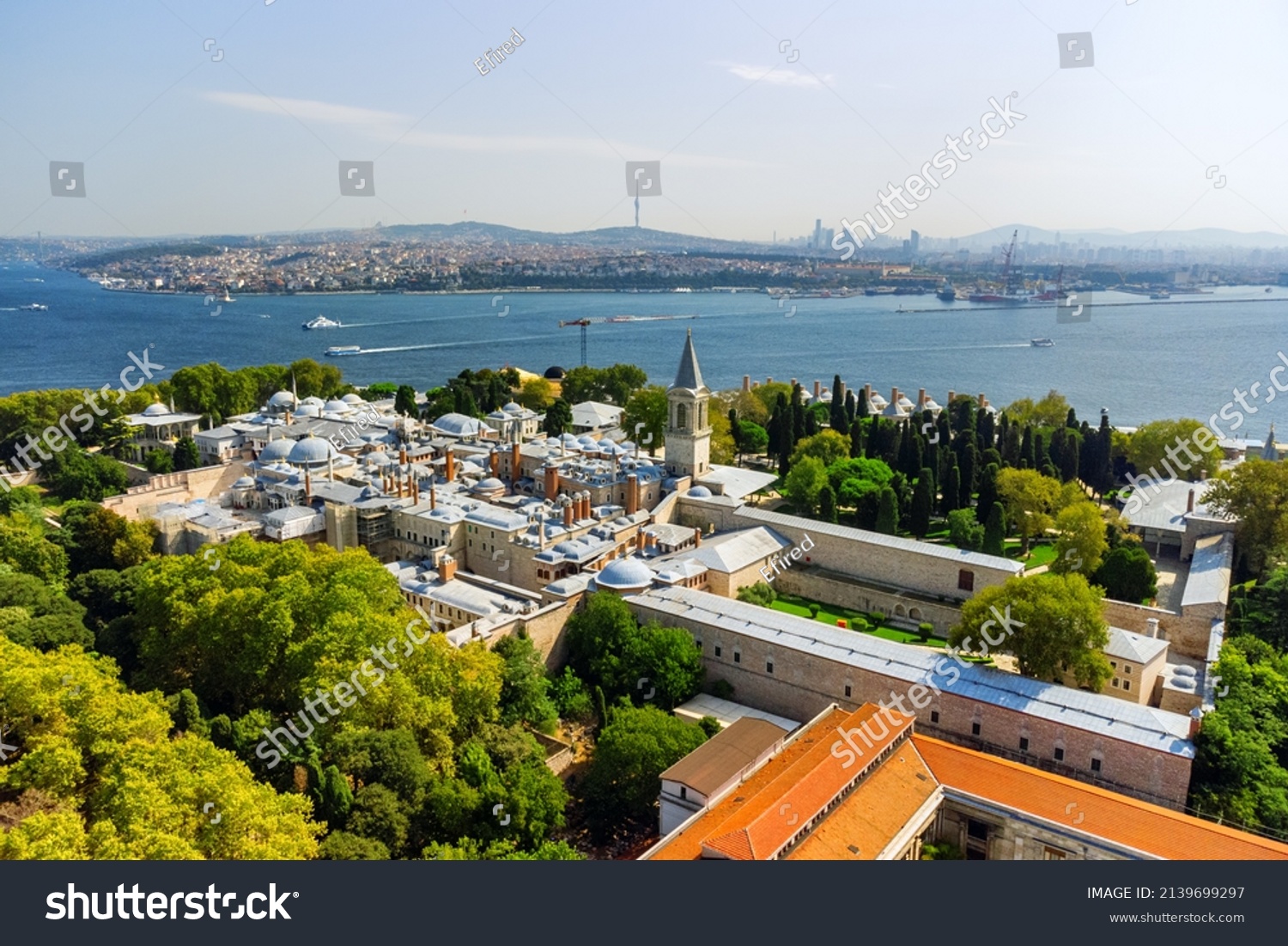Awesome aerial view of the Topkapi Palace in Istanbul, Turkey. Drone flying over the city. The Bosporus is visible in background. Amazing cityscape. #2139699297