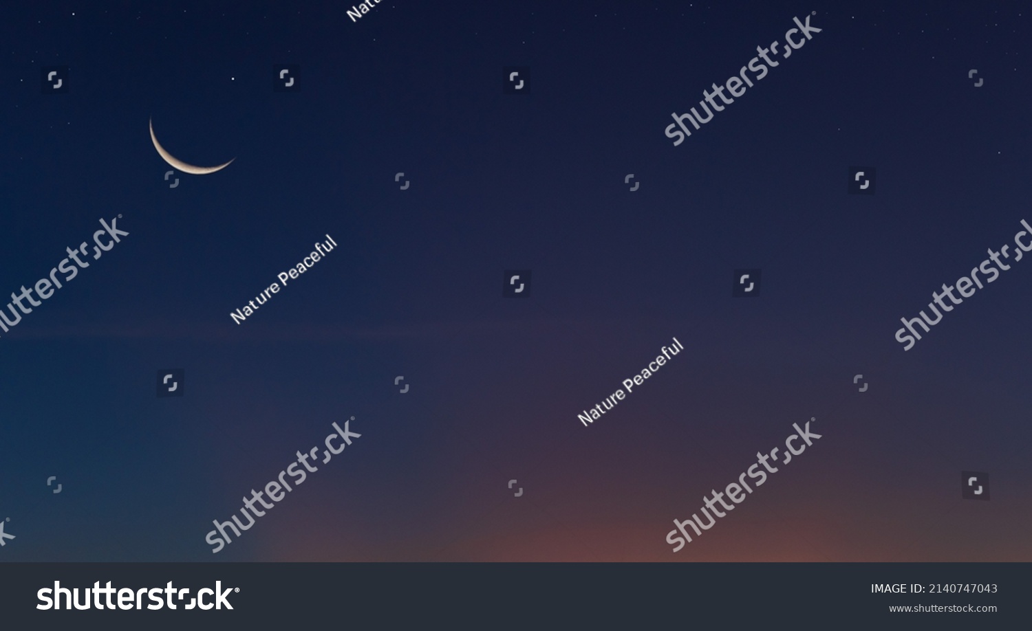 Crescent moon on dusk sky Twilight after sundown free space for text, Religion off Islamic on ramadan month, Eid Al Adha, Eid Al Fitr, Muharram  #2140747043
