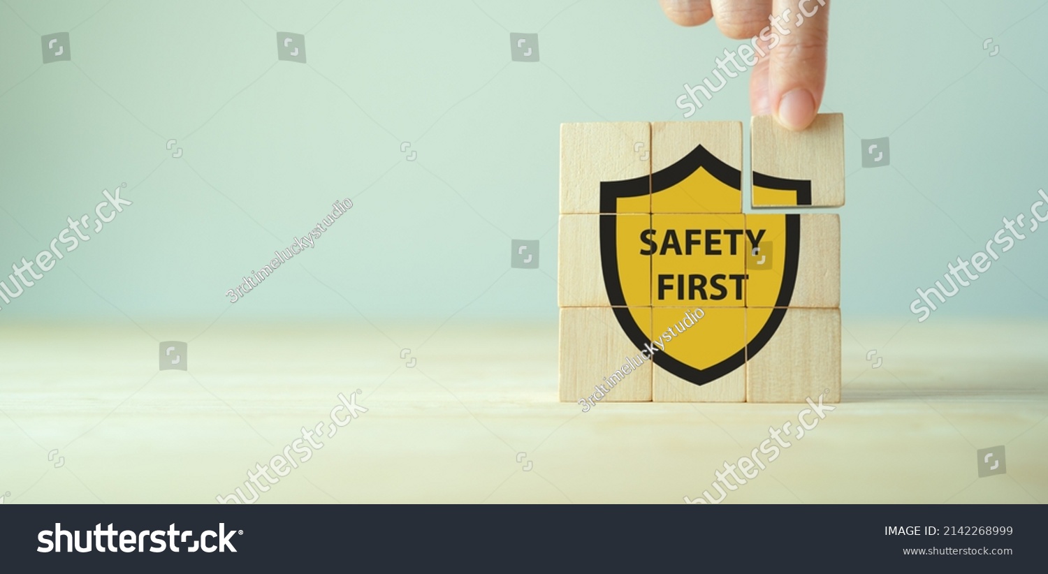 Safety first symbols, work safety, caution work hazards, danger surveillance, zero accident concept. Wooden cubes with smart grey background. Employees safety awareness at workplace. Safety banner. #2142268999