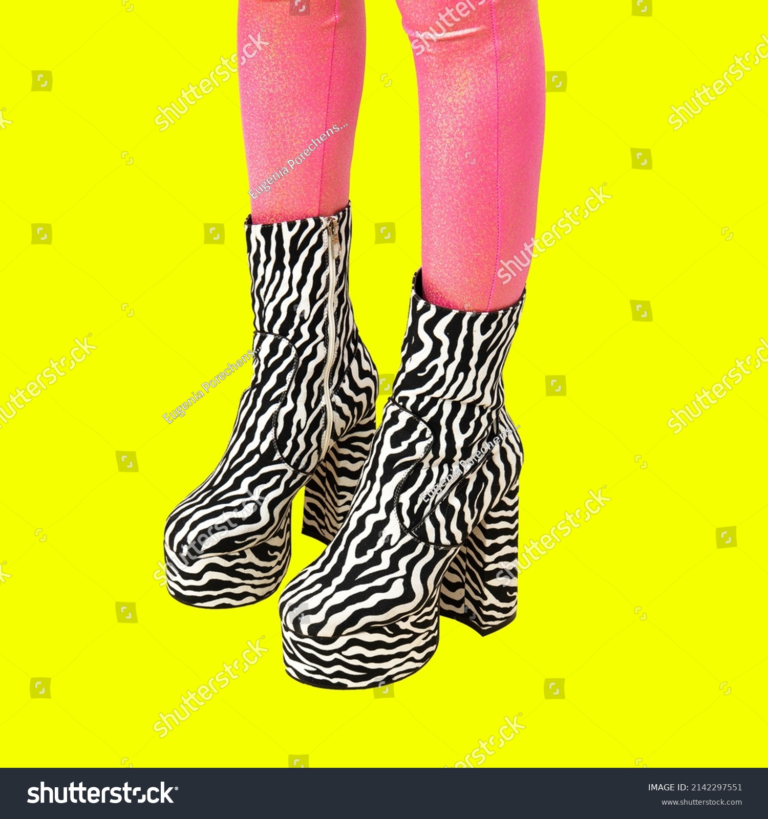 Contemporary digital collage art. Boots Zebra shoes unrecognizable feet in isometry. Fashion Animal print party concept #2142297551