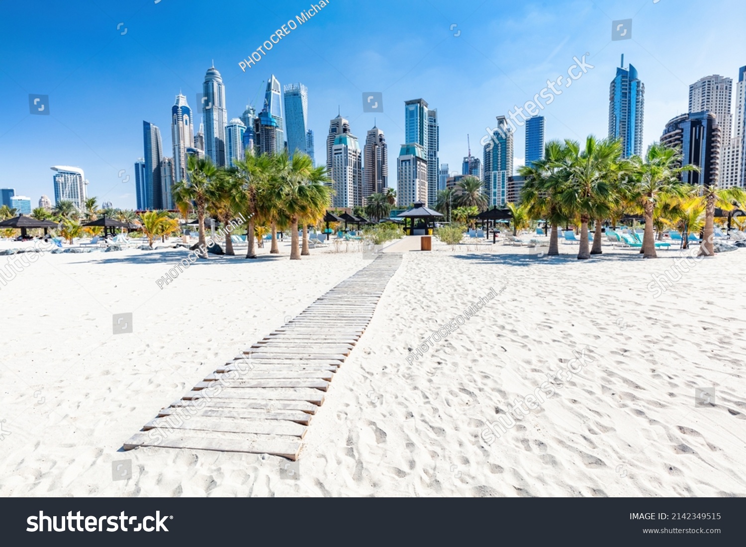 Dubai jumeirah beach with marina skyscrapers in UAE. Popular public JBR beach #2142349515