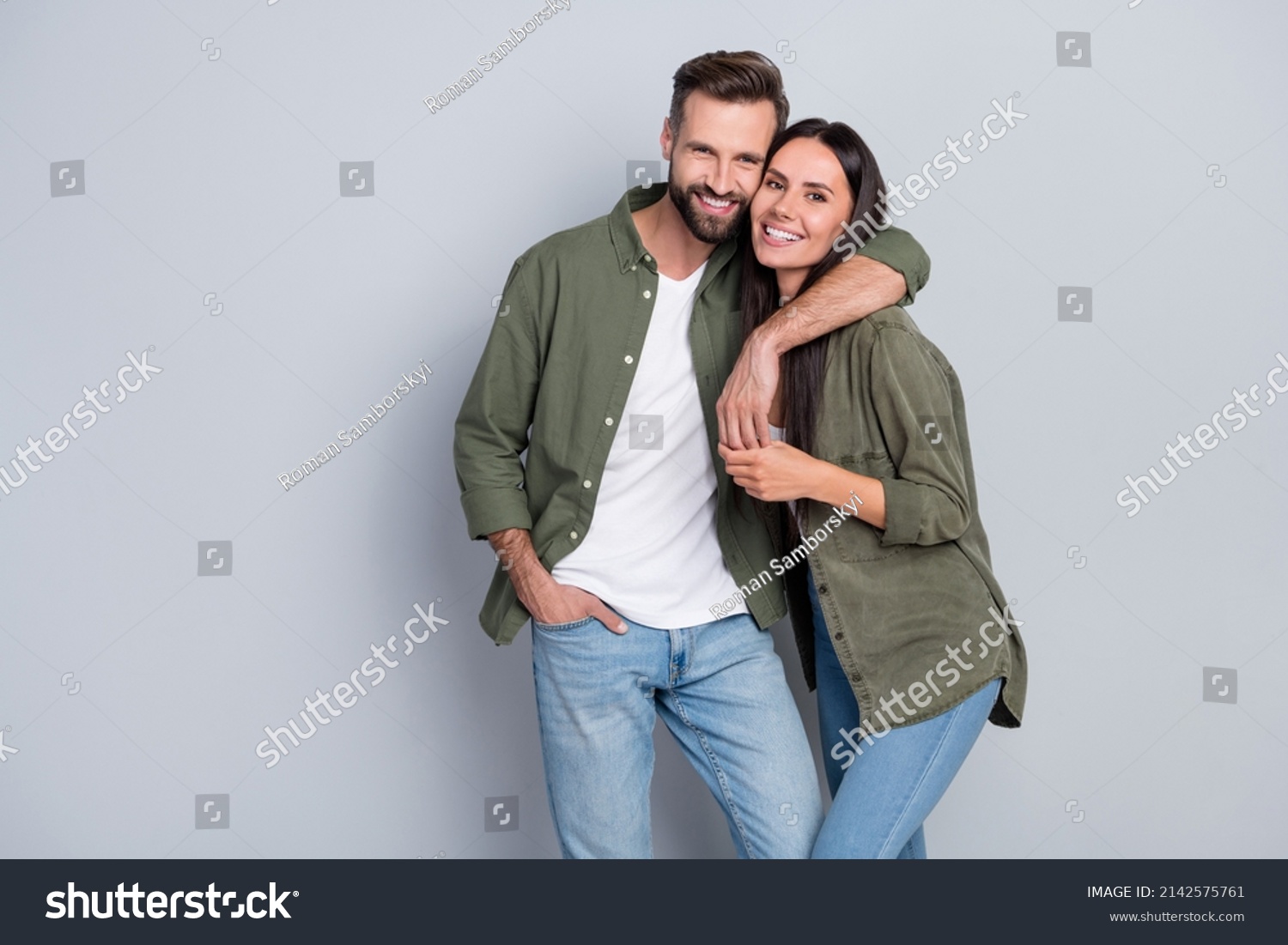 Portrait of attractive tender gentle cheerful couple life partners cuddling romance isolated over grey pastel color background #2142575761