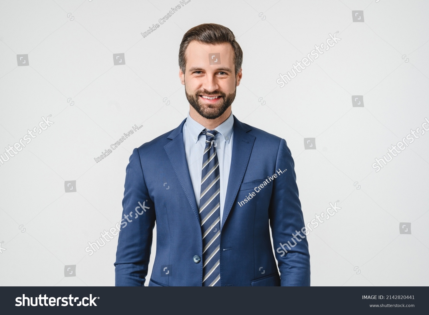 Portrait of handsome caucasian man in formal suit looking at camera smiling with toothy smile isolated in white background. Confident businessman ceo boss freelancer manager #2142820441