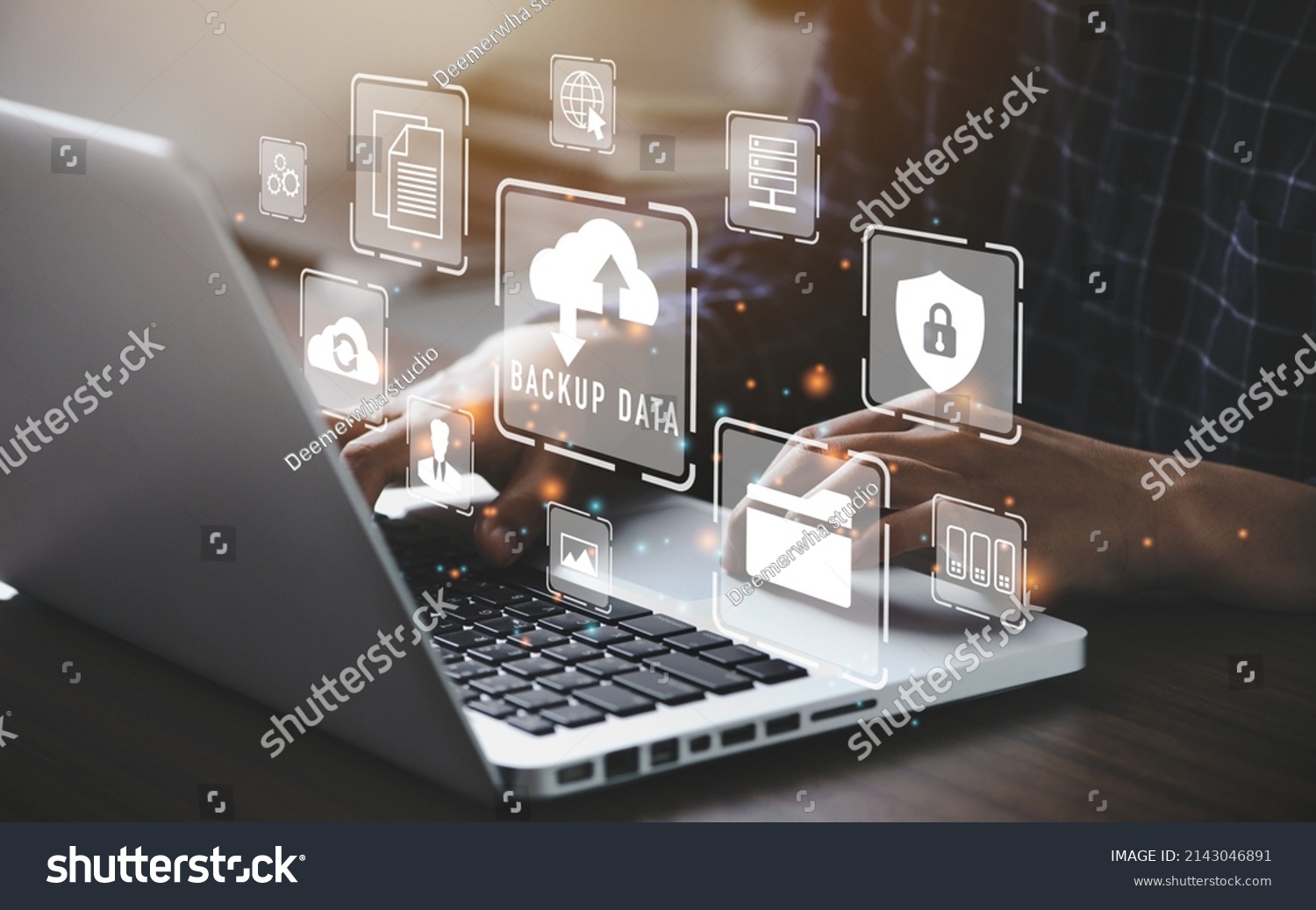 Businessman using a computer to backup storage data Internet technology concept for backup online documentation database and digital file storage system or software,file access, doc sharing. #2143046891