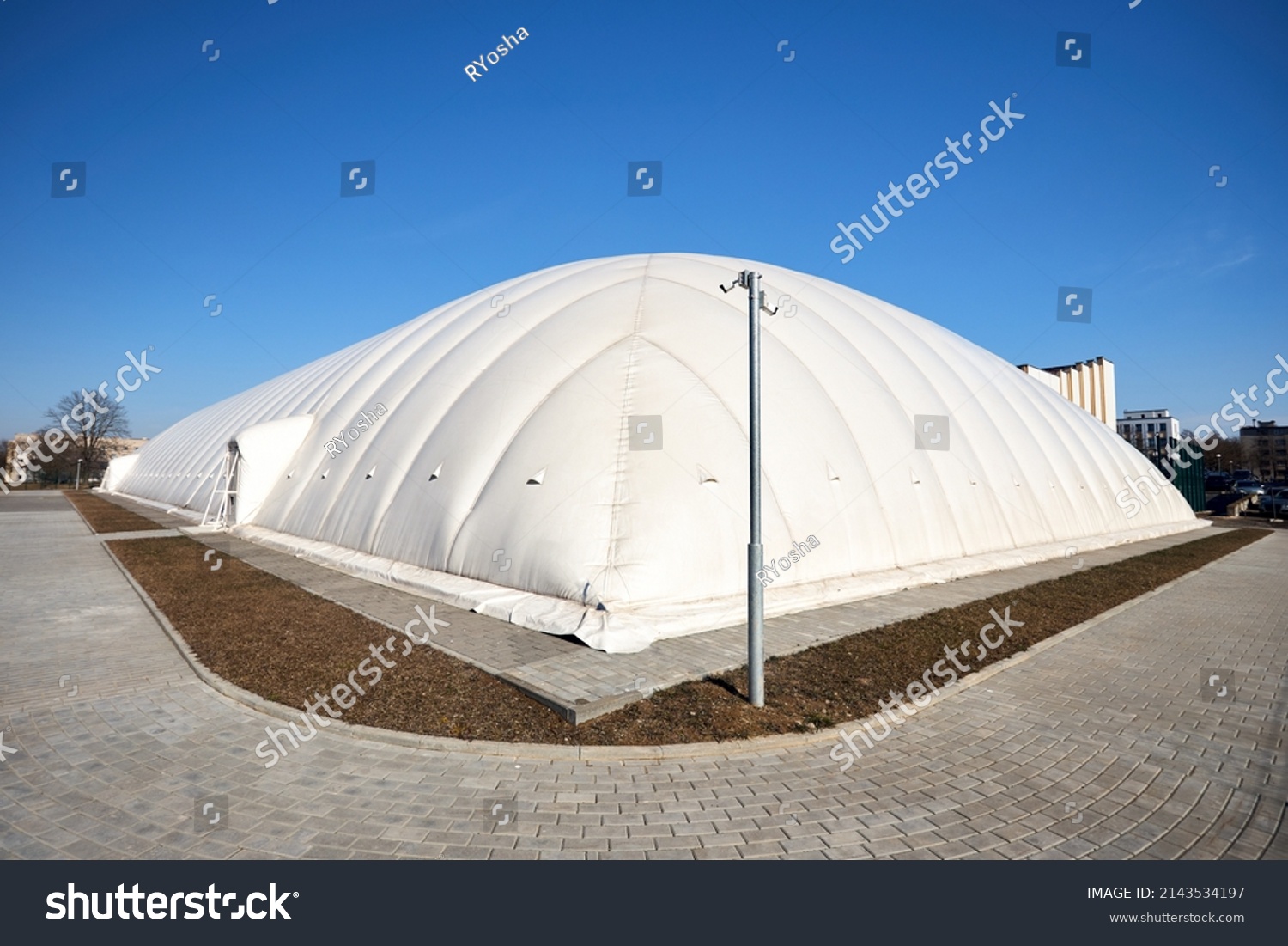 Inflatable air dome stadium. Inflated Tennis air dome or Tennis bubble arena. Modern urban architecture example as pneumatic stadium dome. #2143534197