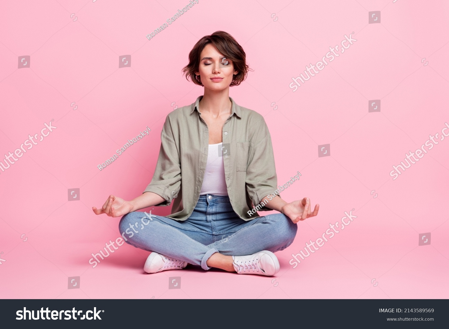 Full body photo of pretty focused lady sit lotus position meditate mudra fingers isolated over pastel color background #2143589569