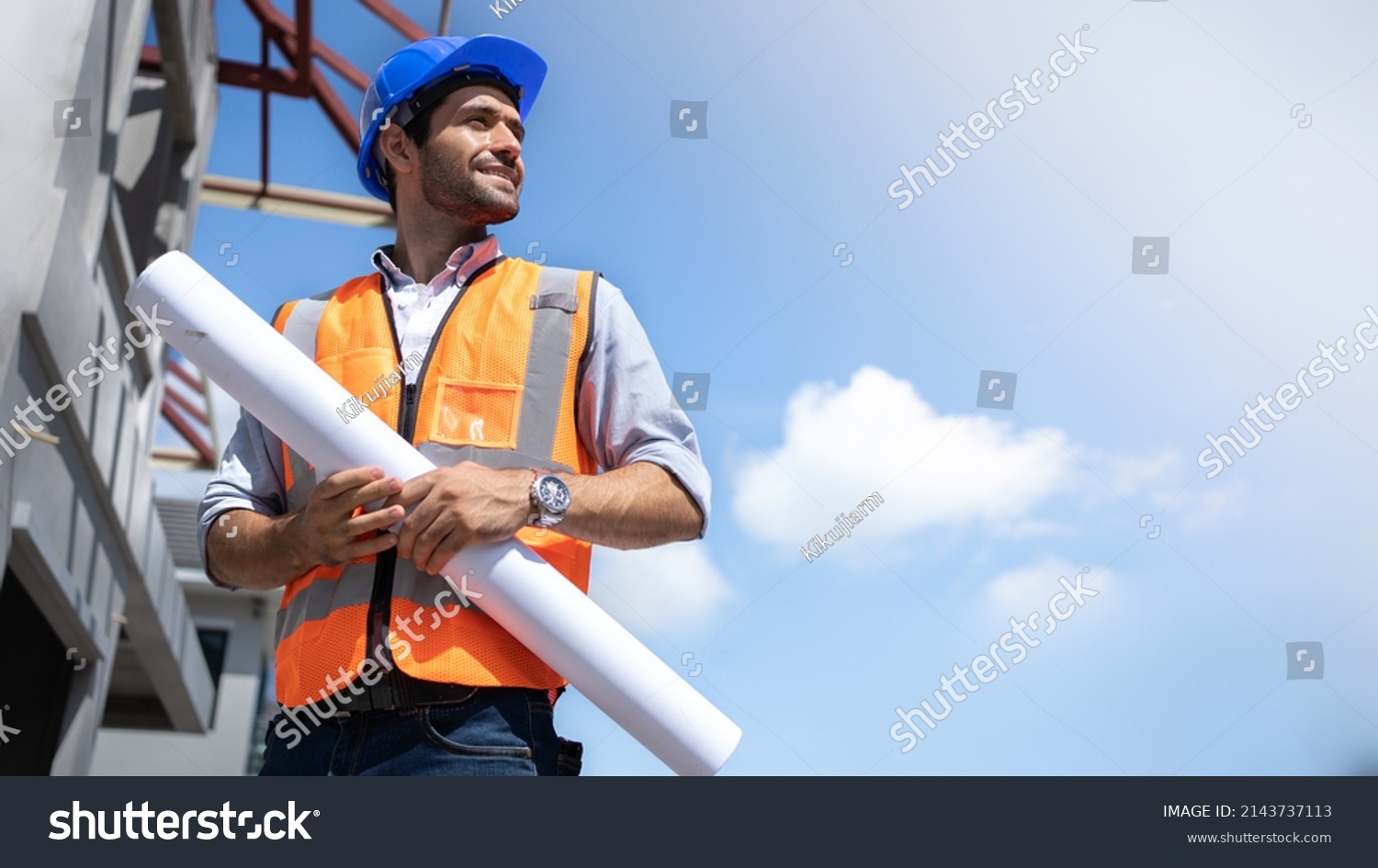 Civil Engineer Hispanic smiling with Constuction backgrounds, use for banner cover. Success in target of project goal Handsome Middle Eastern worker. #2143737113
