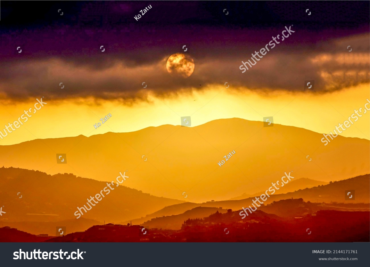 Sunset fall over the mountain peaks. Night fall at sunset landscape. #2144171761