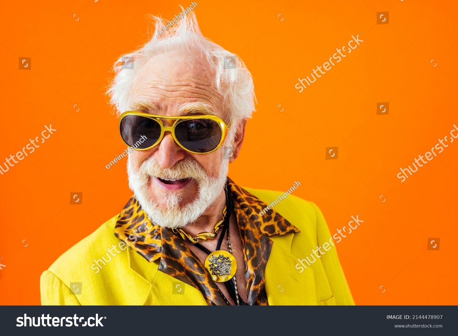 Cool senior man with fashionable clothing style portrait on colored background - Funny old male pensioner with eccentric style having fun #2144478907