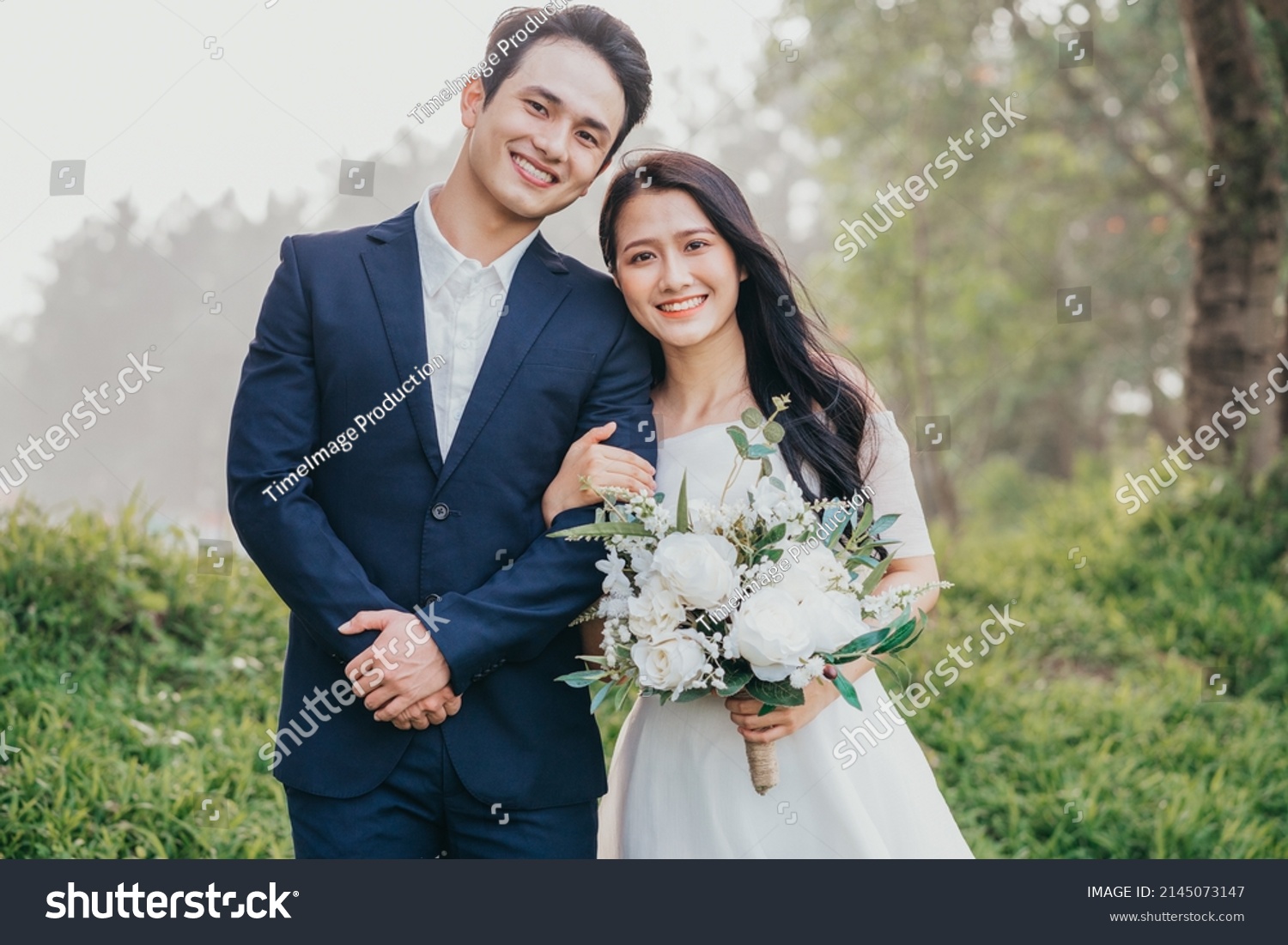 Image of young Asian bride and groom #2145073147