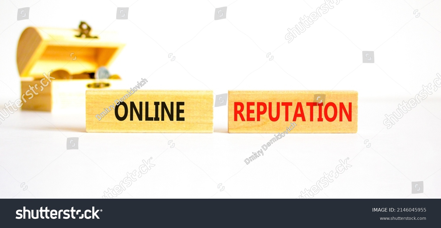 Online reputation symbol. Wooden blocks with concept words Online reputation on beautiful white background. Wooden chest with coins. Business online reputation concept. Copy space. #2146045955